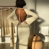 Cinessd - solid knitted open back flared long sleeve maxi dress